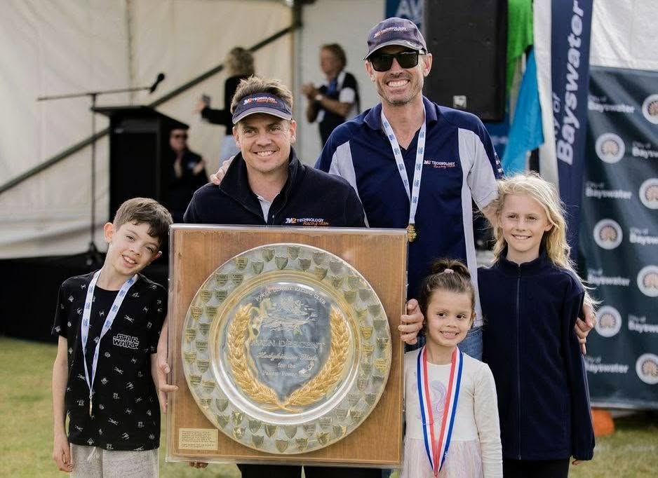 The crew and their children with the Avon Descent trophy plate at the presentation